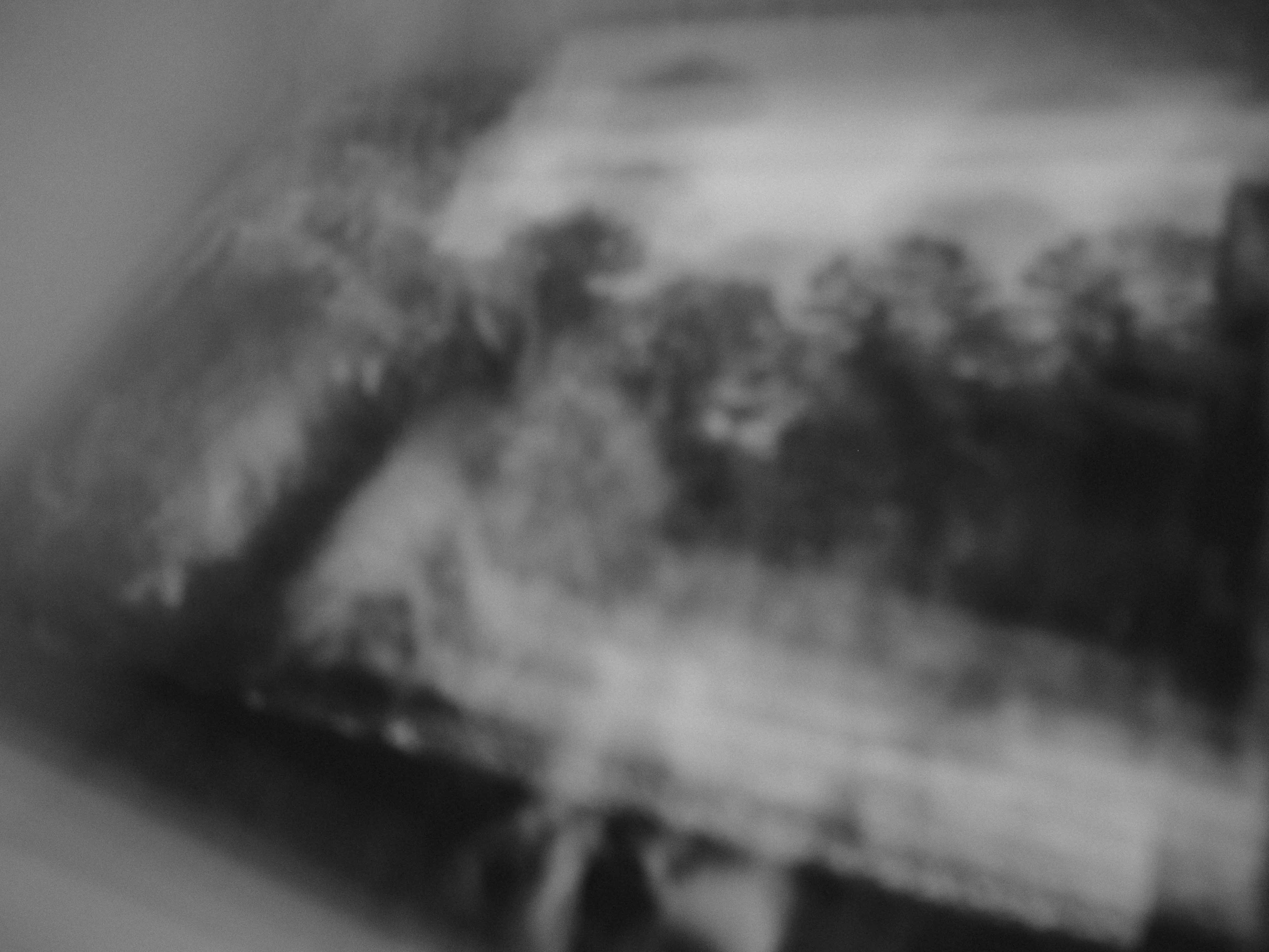 Woman with sunglasses walking down runway